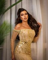 فستان محمد حمادة الذهبي 3