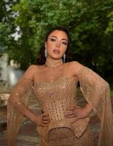 فستان محمد حمادة الذهبي المطرز 2